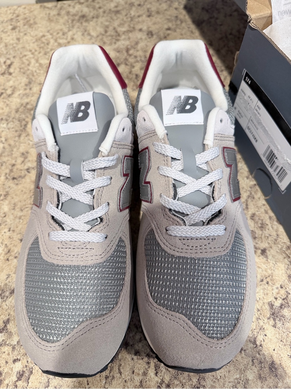 New Balance woman’s Grey, White and Maroon Sneakers 574